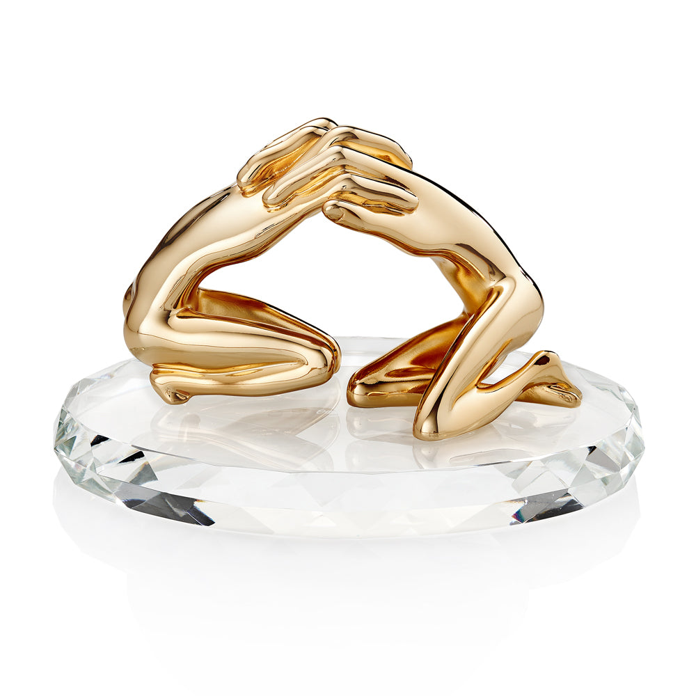 SCULTURA "ABBRACCIO" ORO CON BASE IN CRISTALLO