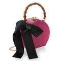 CLUTCH IN ECOPELLE CON FIOCCO IN STOFFA