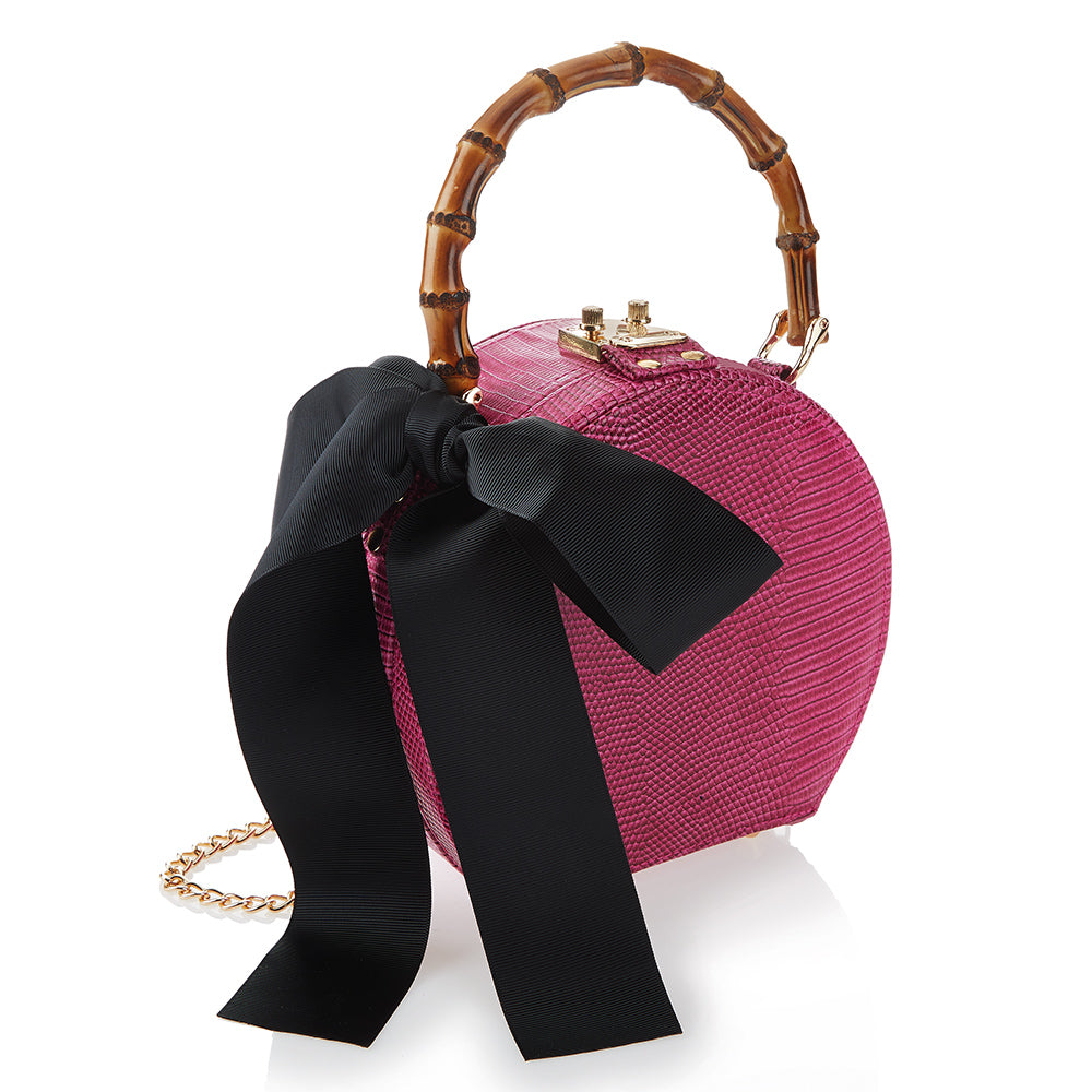 CLUTCH IN ECOPELLE CON FIOCCO IN STOFFA