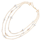 COLLANA DORATA CON CRISTALLI E PERLE