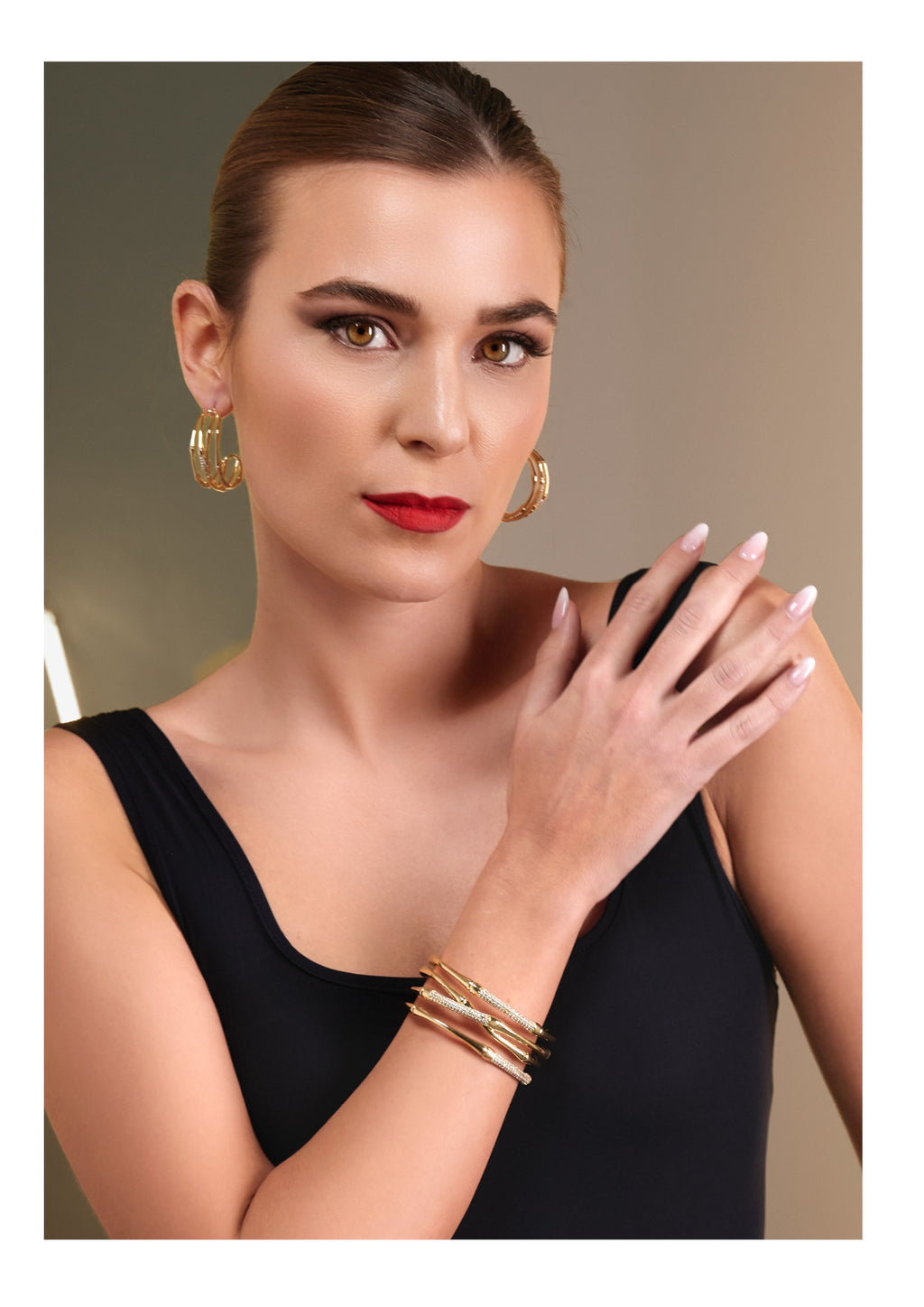 BANGLE DORATO CON CUBIC ZIRCONIA