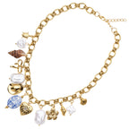 COLLANA DORATA CON PERLE CONCHIGLIA E PORCELLA