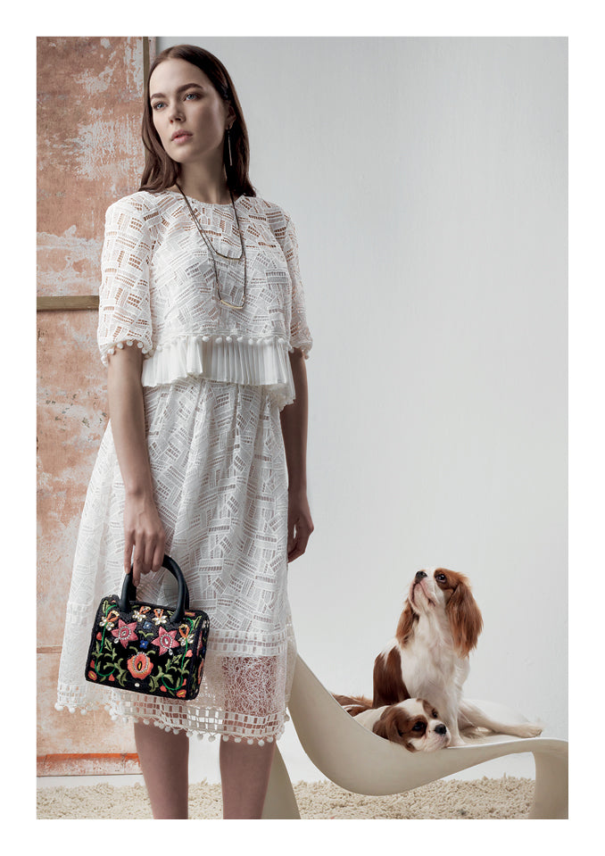 CLUTCH CON CRISTALLI E PERLINE