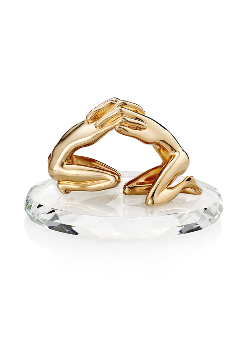 SCULTURA "ABBRACCIO" ORO CON BASE IN CRISTALLO
